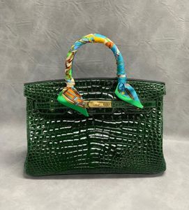 Ladies handbag made of classic alligator skin with arched bead emerald gold clasp handmade wax thread4022724