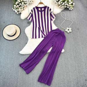 Fashion set for women with lazy style round neck and irregular loose striped sweater two-piece high waisted wide leg pants