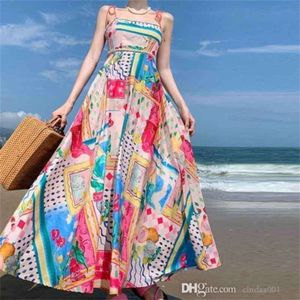 Kvinnaklänningar designer sommaren ny ärmlös kragefri hög midja tryckt färgad slitage stor hem hängande rem klänning