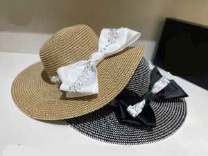 Cappelli di paglia oversize di design di lusso secchielli a tesa larga cappello moda berretto da spiaggia donna estate grandi berretti di cannucce protezione UV pieghevole sole