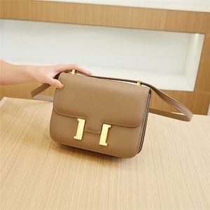 Feito à mão Kangkang Comissário de Voo Pequeno Quadrado Moda Um Ombro Crossbody Axilas Bolsa de Tofu Premium 55% de desconto na fábrica on-line