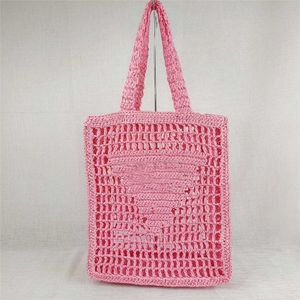 Neue Frühlings- und Sommertasche im gleichen Papierseil-Stroh-Tote-Stil, eine Schulter, tragbar, INS, hohle, gewebte Damentasche mit Buchstaben. 55 % Rabatt auf den Online-Shop