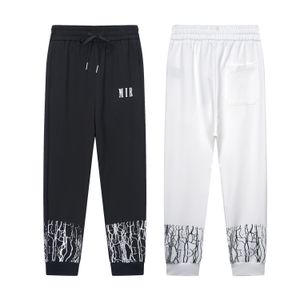 Designer sweatpants Men letter logo Foot print crack trousers Quality Top fashion Pure black white cotton luxury size M-2XL