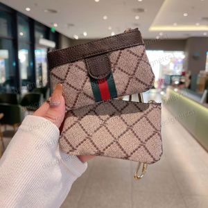 Luxo pequeno zip carteiras homens mulheres designer chave bolsa moeda bolsa de couro genuíno carta em relevo titular do cartão de crédito fone de ouvido saco de embreagem atacado presente