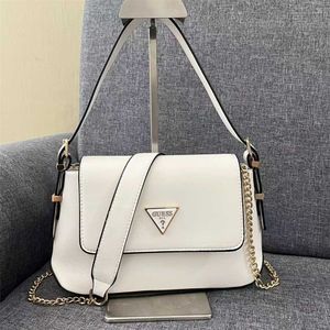 Ny solid färgkedja Splice Belt Decoration Fashion Cross Shoulder Underarm Women's Bag 60% RABATS Online Online