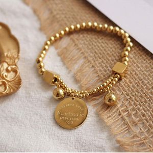 Charme pulseiras elástica cor de ouro frisado pulseira para mulheres aço inoxidável atacado moeda carta disco moda delicada 2023