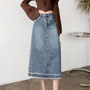 Kjolar tassel stitching denim kjol 2023 sommar kvinnor vintage hög midja a-line midi y2k mode all-match lös blå jean