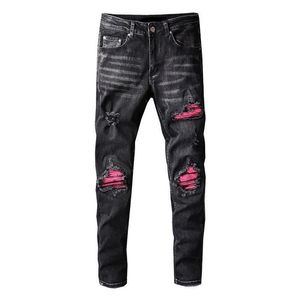 Jeans da uomo Street Tide High Youth Pink Spell Toppa rotta in vera pelle Microelastico nero da uomo198b