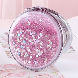 Kompakta speglar Portabla dubbelsidiga fällbara kosmetiska spegel Kvinnliga gåvor med flödande mousserande sand mini Makeup Mirror Compact Pocket Mirrors 230904