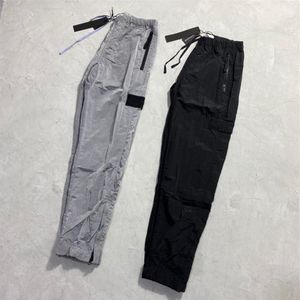 Брендовые дизайнерские брюки, повседневные брюки из каменного металла, нейлона с карманами и вышитым значком, тонкие светоотражающие островные брюки, размер M-2XL281I