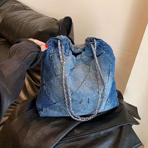 Den senaste nettokloten med liten doftande vintage denim stor kapacitet underarmspåse tygväska fabrik direktförsäljning 27*8*28