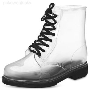 Botas de chuva venda quente-arent sapatos de água para mulher clássicos arco apartamentos de salto baixo tubo médio botas de chuva à prova dwaterproof água sapato