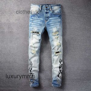 Jean 2023 Amirrs Designer Jeans Amirrsy Casual Hip Hop Desgastado e Lavado Splash Ink Color Pintura Slim Fitting Masculino 2PLG