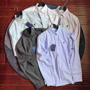 Camisas casuais masculinas designer início do outono nova camisa oxford listra pônei bordado básico negócio simples polo manga longa homens wzez