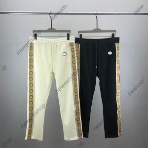 24ss Mens Pants Designer Swearpant Erkekler Şerit Birleştirme Pantolonlar Swearpants Kadın Yan Mektup Baskılı Rahat Nefes Alabilir Gevşek Uyum Uzun Pantolon