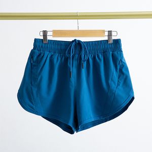 LL Hög midja designer shorts kvinnor yoga kläder träna korta byxor fitness slitage flickor som kör elastiska vuxna byxor sportkläder fodrad dragsko