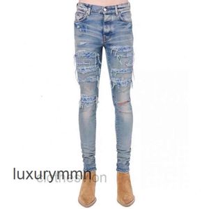 Jeans Amirrs T Shirts Designer 2023 Jean Style Heavy Industry Washing Water Damage Hole Waist Flower Printing Cable Splicing TT6X