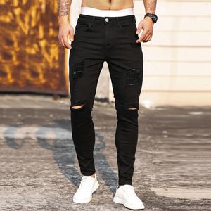 Jeans da uomo per uomo con foro autunnale pantaloni in denim con piedi piccoli pantaloni con tasca slim elasticizzati in puro colore pantaloni streetwear da uomo