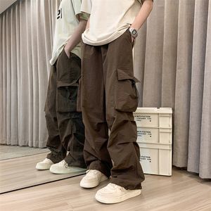 Mężczyzn Pants Mężczyzn Casual Cargo Streetwear Big Pocket Baggy Mopping Spodni Harajuku Hip Hop Loose Women Women Noge Bojowal 230906