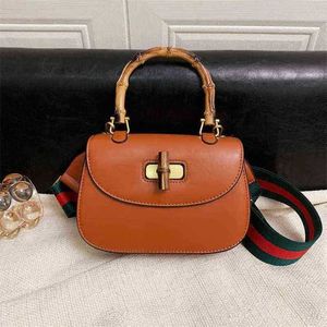 2024 New luxury high quality handbag Batch of fashionable hands bamboo half round minority teacher saddle