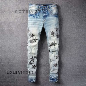 Jeans 2023 AMIRRS Designer Jean Amirrsy Casual Hip Hop desgastado e lavado pintura de cor de tinta salpica