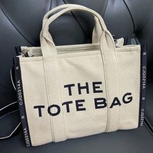 الكماليات The Tote Bag Marc Womens Womens Mens Designer Bag Cowboy Pochette Bag Crossbody Canvas Nylon Travel Clutch Bagslrns#