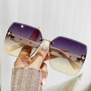 2023 New Large Frame Sunglasses with Frameless Trimmed Edges Advanced Street Photography Women's Plain Face