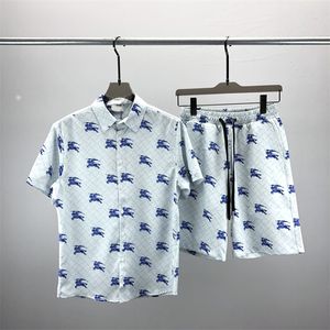 23 moda estiva Tute da uomo Pantaloni da spiaggia Hawaii set camicie firmate stampa camicia per il tempo libero uomo slim fit il consiglio di amministrazione manica corta spiagge corte 025