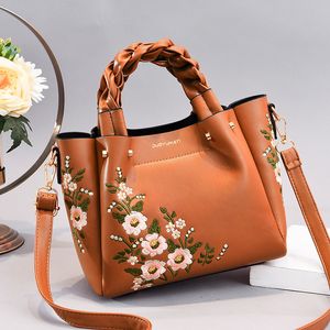 Sacos de ombro femininos de fábrica 8 bolsa de bordado de flores elegantes diariamente bolsa de couro de cor sólida deste ano bolsas de tecido 0626#