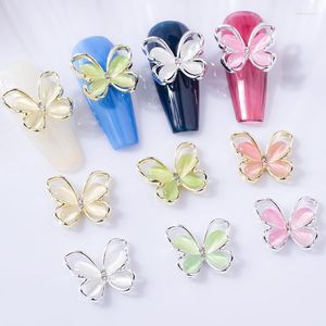 Decorações de arte de unhas 10pcs olho de gato pedra borboleta jóias liga 3d diamante incorporação acessórios ocos coloridos