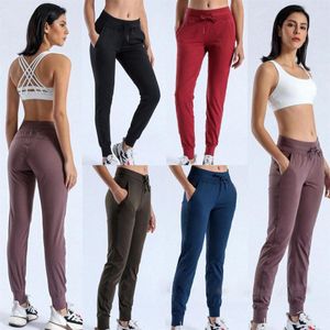 Stoff Naked-Feel Workout Sport Jogger geschnittene Hosen Womens Taille Draw String Fitness Running Sweat Pant mit zwei Seitenpockt192H