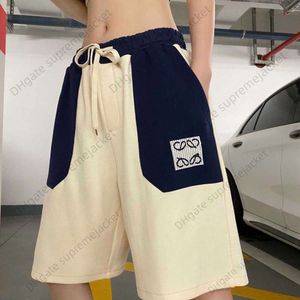 Shorts de verão de alta qualidade Loews Dragon Bag Cat Color Matching Bordado Shorts esportivos casuais populares masculinos e femininos capris versáteis