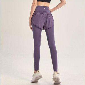 LL Women Yoga Leggins Spódnica Fałszywy dwuczęściowy zestaw dresowy popularne oddychane przeciwzakręgowe spodni na siłowni trening rajstopy nogging293r