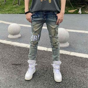 mens jeans amirs Chao brand fog high street hole letter printing used washing elastic locomotive slim legged jeans266W