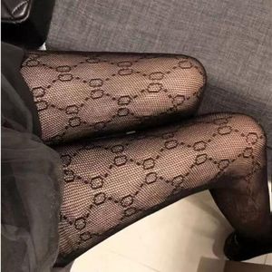 Autumn and winter tight one-piece silk stockings pattern Elastic Black Fishnet tight silk stockings with hollow sexy2096