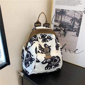 Factory wholesale women shoulder bag 3 colors street totem printed handbag soft and light stitching Oxford leisure backpack retro buckle student backpacks 2055#