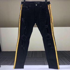 Jeans da uomo Ginocchia strappate Pantaloni slim a righe rosa glitter con bordi dorati e rifiniti in argento Nero di alta qualità213j