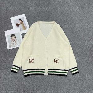 Suéteres de designer Mulheres Camisola Cardigan Jaqueta de malha Listrada Hem Elástico Solto Encaixe Manga Comprida Bolso Duplo Malhas Outono Calor Top Designer Cardigan