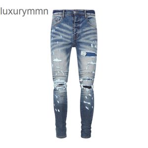 Denim Amiryes Jeans Designer Pantaloni Uomo Uomo Jean Nuova moda Blu scuro Falso toppa perforata da uomo MFKB