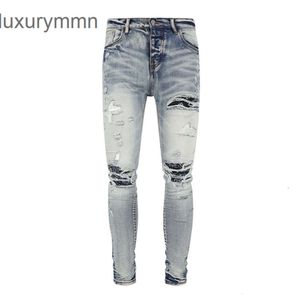 Denim Amiryes Jeans Designer Pantaloni Uomo Uomo Jean 2023New Ginocchio Anacardi Fiore Patch Azzurro Slim Fit 4Z5J