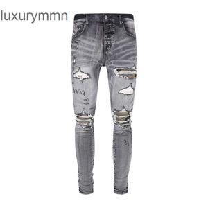 Denim Amiryes Jeans Designer Pantaloni Uomo Uomo Jean JB Nuovo foro per il ginocchio da uomo Colletto mimetico danneggiato 1G1T