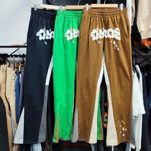 Calça masculina calça de moletom impressão de espuma esportes casuais de cor solta combinando calças elásticas ligeiramente alargadas