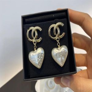 White pearl heart charm earrings Bright copper material personalized shape Brand fashion classic luxury earrings designer for w262M
