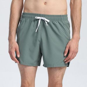 Män shorts män sommar dragkammare fast färg ficka elastisk midja delad daglig slitage tunna jogging sport manliga kläder