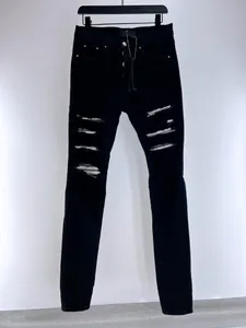 Designer da uomo Jeans da uomo Pantaloni Jean Hombre neri Patchwork strappati per pantaloni da motociclista di marca di tendenza da uomo skinny