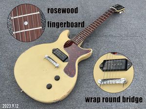 Elektrisk gitarr Rosewood Fingerboard Cream Color Paint Relic Work Aged Chrome Parts Wrap Round Tail