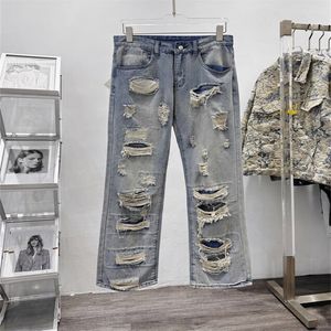 Mäns plus -storlek Pants Street Hip Hop High Street Men's Jeans Slim Fit Elastic Feet Byxor med trasiga hål Fashion Trend Star samma stilbyxor 43L88