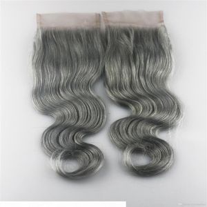Säljer 4x4 grå# spetsstängning mänskligt hår brasilianskt jungfruligt hår kroppsvåg schweizisk spets stängning213t