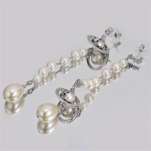 Śliczna planeta długa frędzla z pieczęcią Saturn Pearl Stud Cenring Fashion Biżuteria