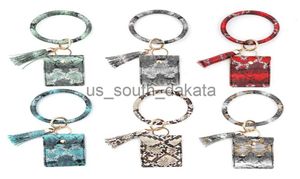 Key Rings Card Bag Armband Keychain Wristlet Jewelry Pu Leather Tassel Coin Purse Bangle Car Keys Holder Fashion Round Keyring Ring Chain Charm8029107 X0914